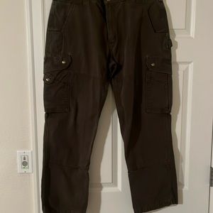 Carhartt relaxed fit for men. Color brown. Size 38/30 . Inseam 29”